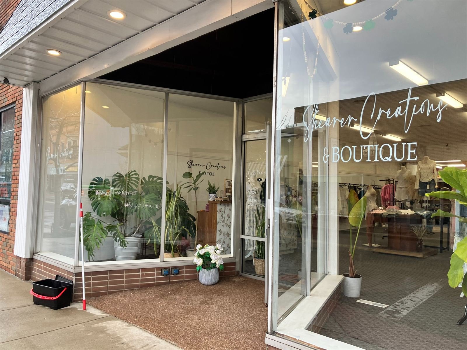 Clean storefront windows on a local boutique